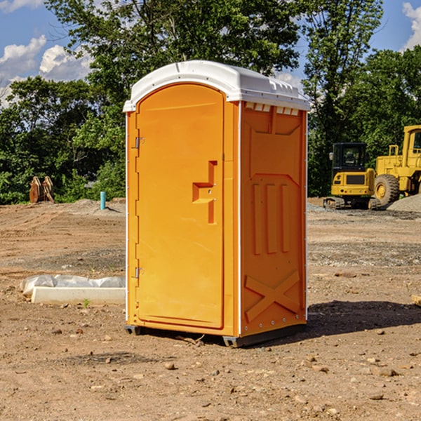 how often are the portable restrooms cleaned and serviced during a rental period in Strang NE